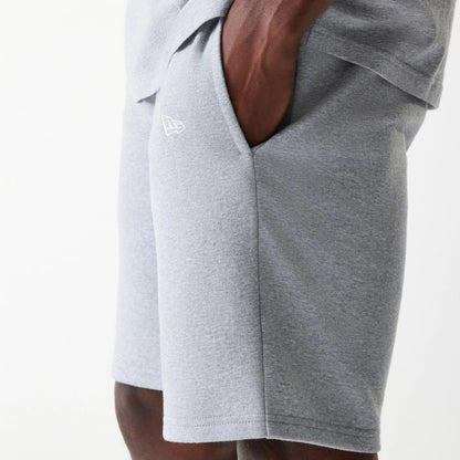 The Male model is wearing New York Yankees MLB League Essential Grey Shorts 5