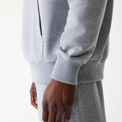 The Male model is wearing New York Yankees MLB League Essential Midi Grey Oversized Pullover Hoodie 5