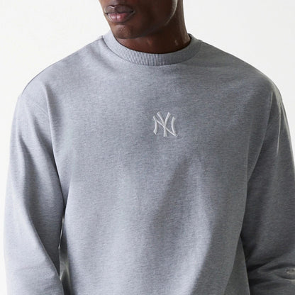The Male model is wearing New York Yankees MLB League Essential Grey Crew Neck Sweater 6
