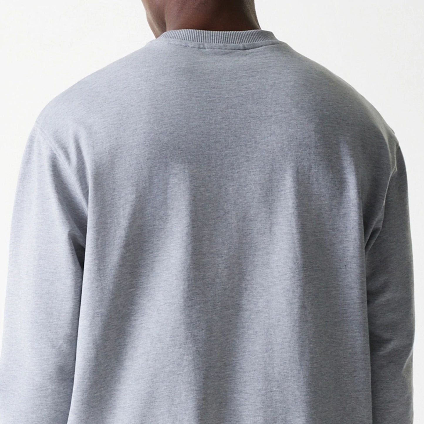 The Male model is wearing New York Yankees MLB League Essential Grey Crew Neck Sweater 7