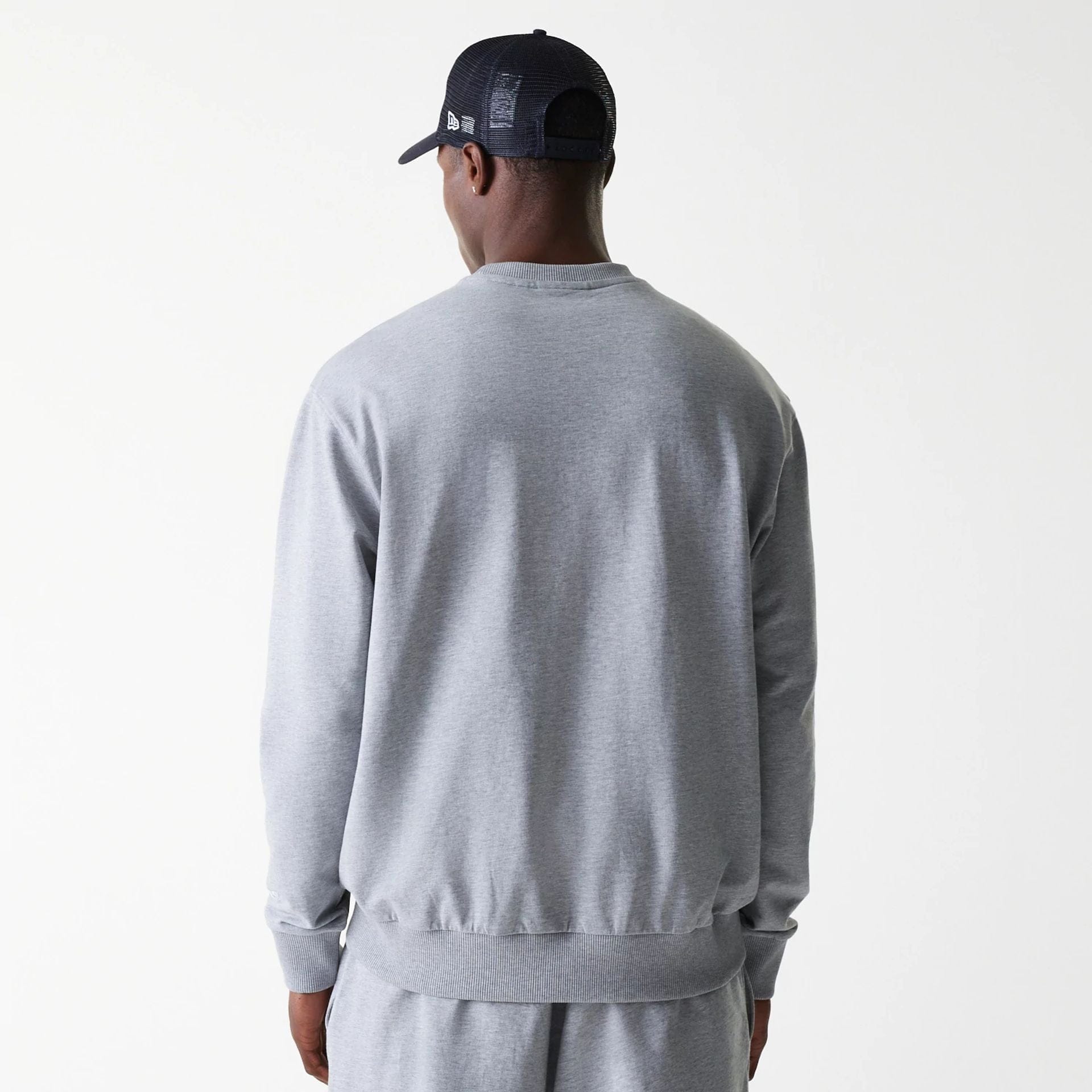 The Male model is wearing New York Yankees MLB League Essential Grey Crew Neck Sweater 2