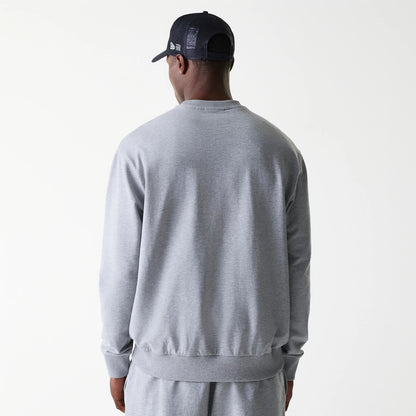 The Male model is wearing New York Yankees MLB League Essential Grey Crew Neck Sweater. 2