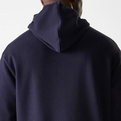 The Male model is wearing New York Yankees MLB League Essential Midi Navy Oversized Pullover Hoodie 7