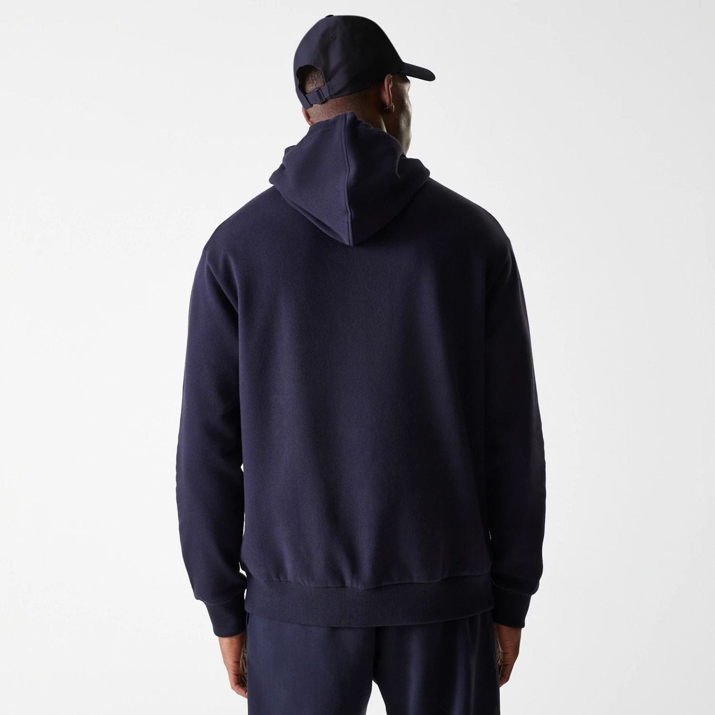 The Male model is wearing New York Yankees MLB League Essential Midi Navy Oversized Pullover Hoodie 2