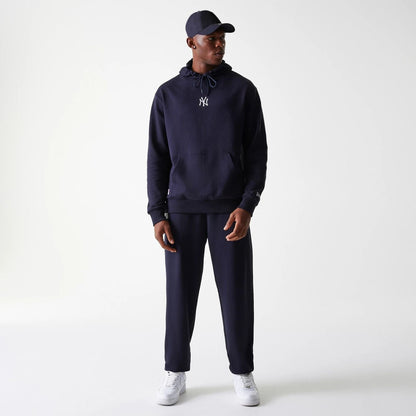 The Male model is wearing New York Yankees MLB League Essential Midi Navy Oversized Pullover Hoodie 8