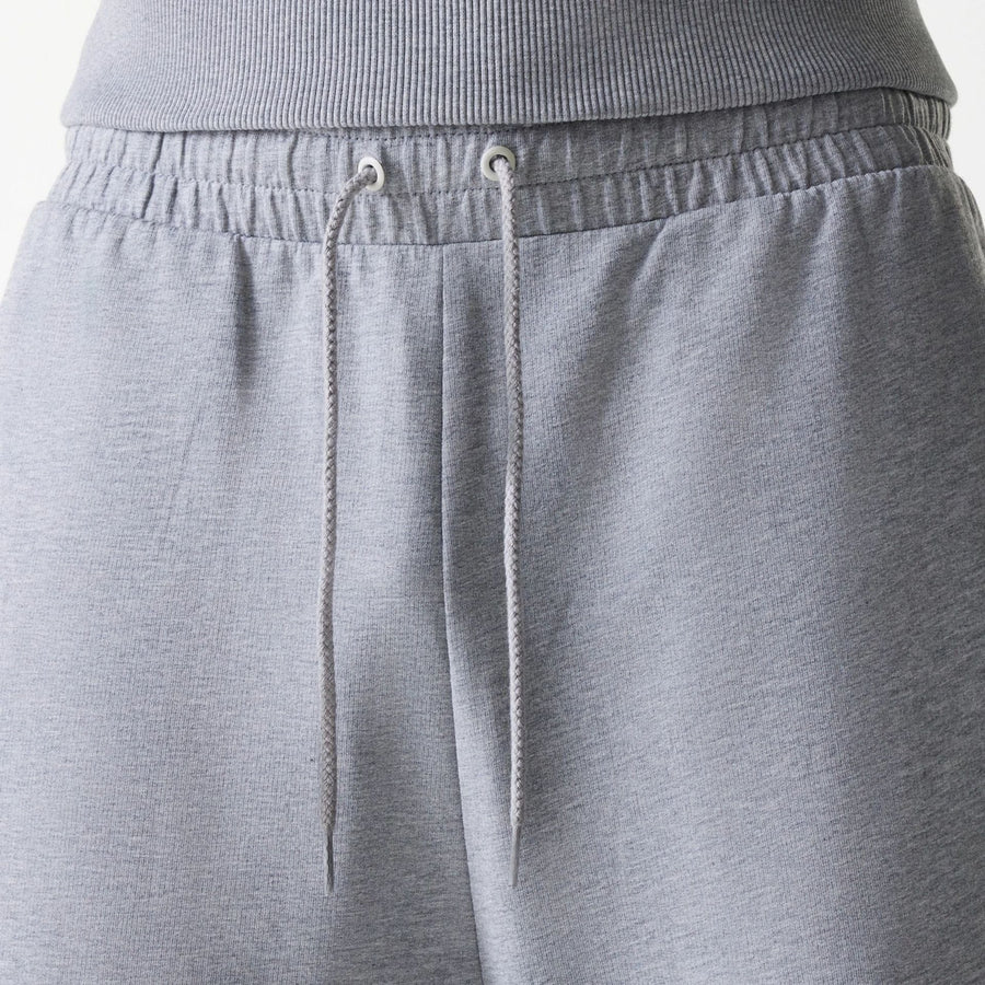 The Male model is wearing New York Yankees MLB League Essential Midi Grey Joggers 6