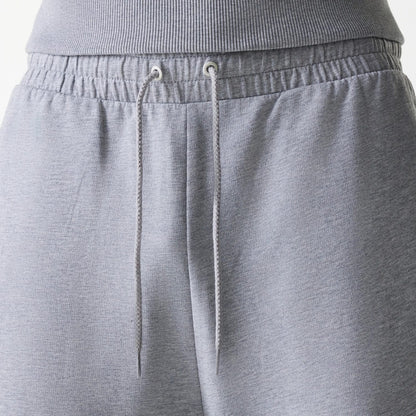 The Male model is wearing New York Yankees MLB League Essential Midi Grey Joggers 6