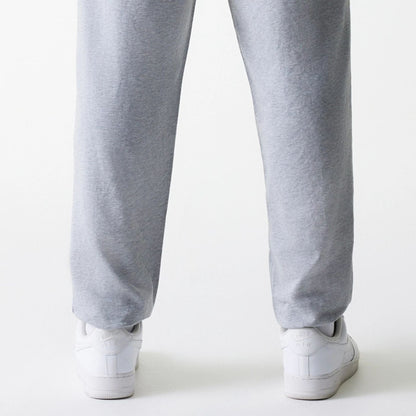The Male model is wearing New York Yankees MLB League Essential Midi Grey Joggers 7