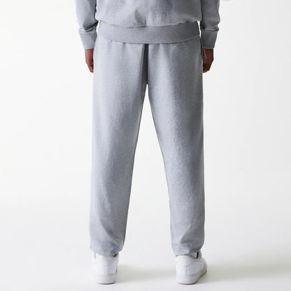 The Male model is wearing New York Yankees MLB League Essential Midi Grey Joggers 2
