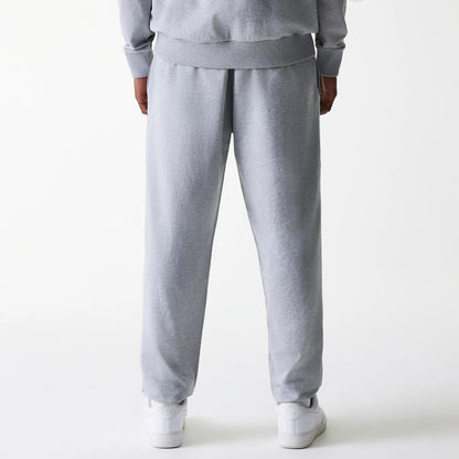 The Male model is wearing New York Yankees MLB League Essential Midi Grey Joggers 2