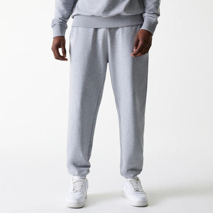 The Male model is wearing New York Yankees MLB League Essential Midi Grey Joggers 1