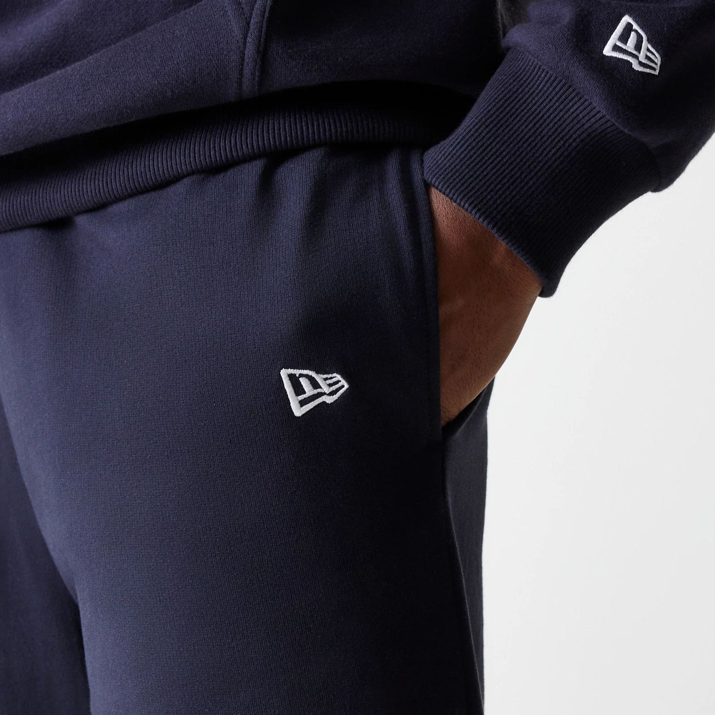 The Male model is wearing New York Yankees MLB League Essential Midi Navy Joggers 5