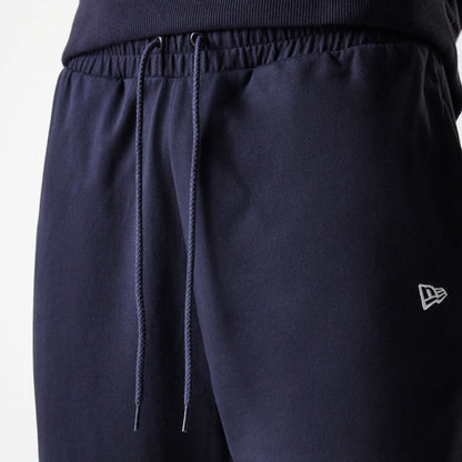 The Male model is wearing New York Yankees MLB League Essential Midi Navy Joggers 6