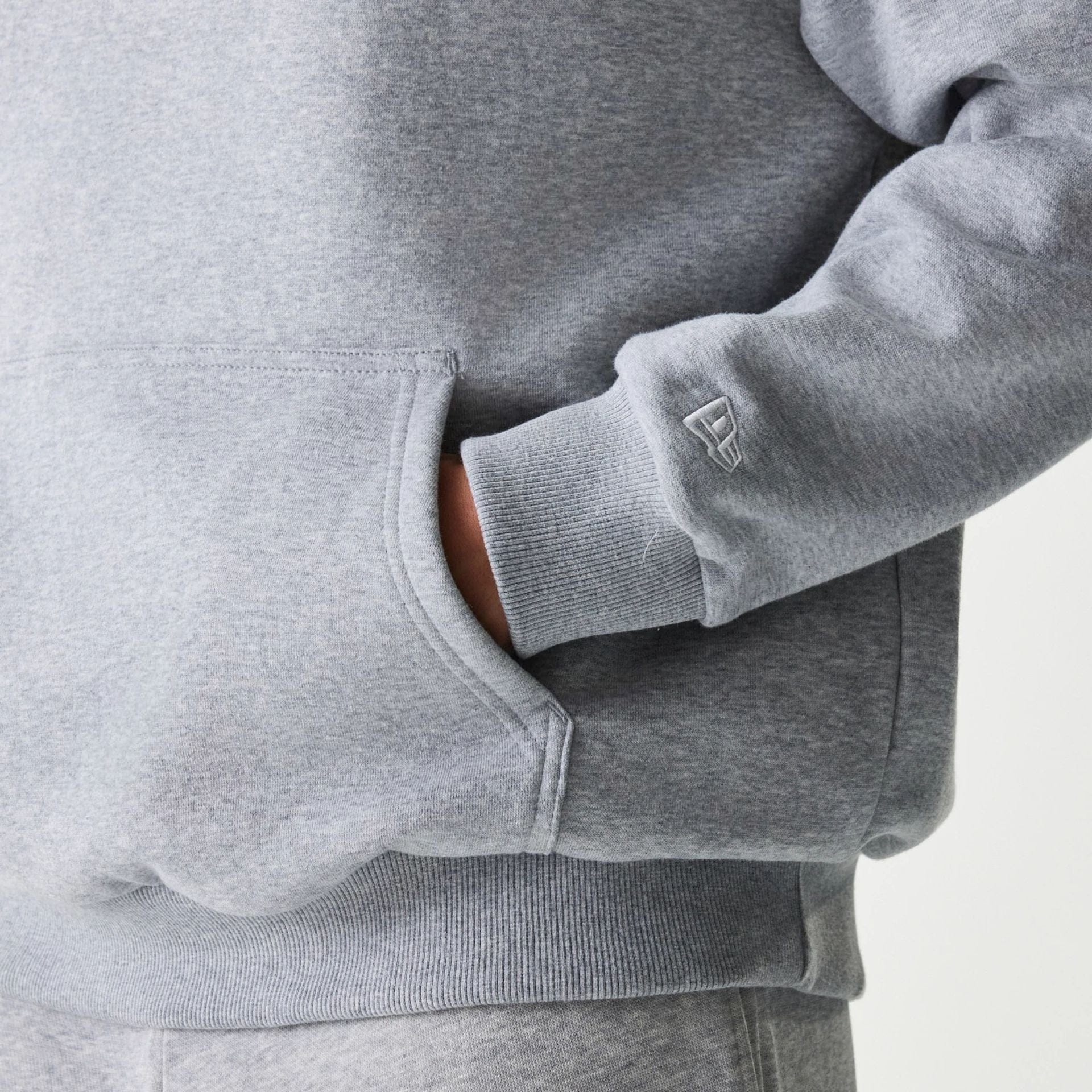 The Male model is wearing New York Yankees MLB League Essential Grey Oversized Pullover Hoodie 7