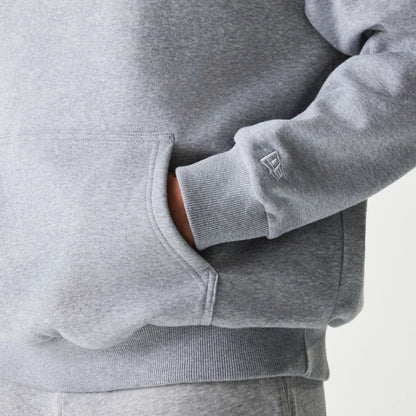 The Male model is wearing New York Yankees MLB League Essential Grey Oversized Pullover Hoodie 7