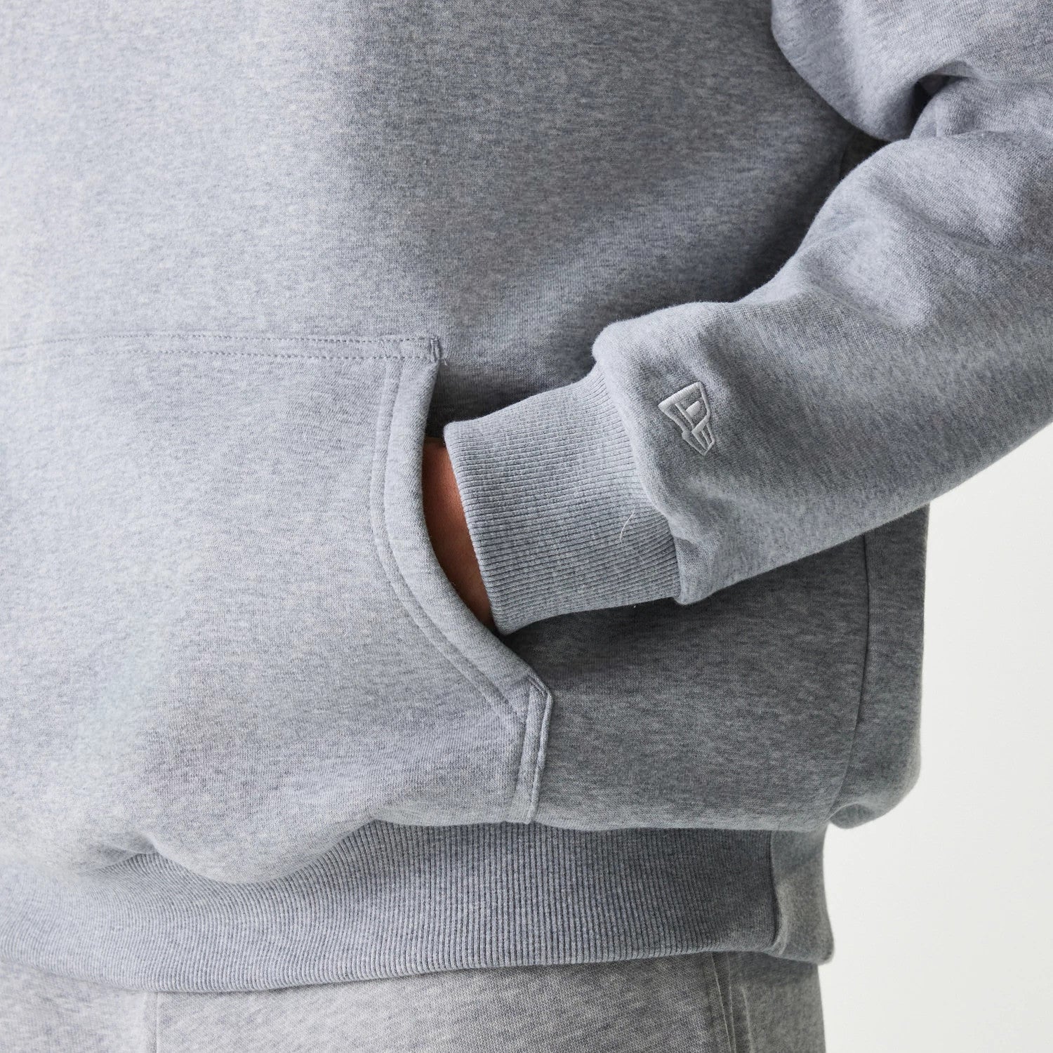 The Male model is wearing New York Yankees MLB League Essential Grey Oversized Pullover Hoodie 7