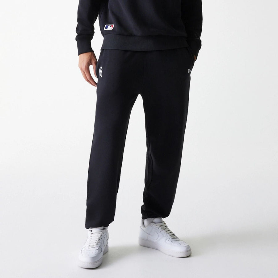The Male model is wearing New York Yankees MLB League Essential Black Joggers 3