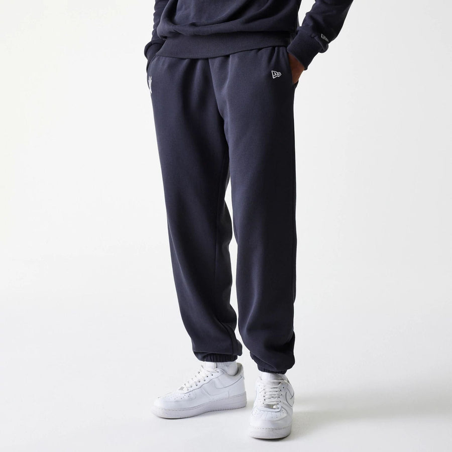 The Male model is wearing New York Yankees MLB League Essential Navy Joggers 3