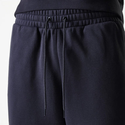 The Male model is wearing New York Yankees MLB League Essential Navy Joggers 6