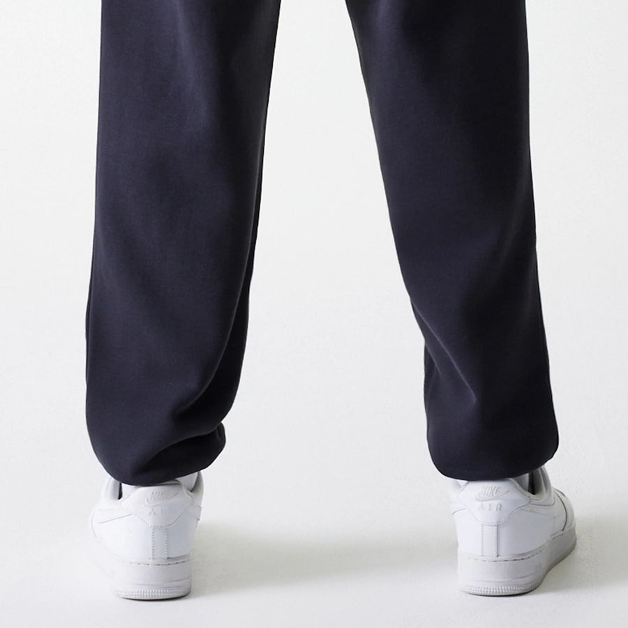 The Male model is wearing New York Yankees MLB League Essential Navy Joggers 7