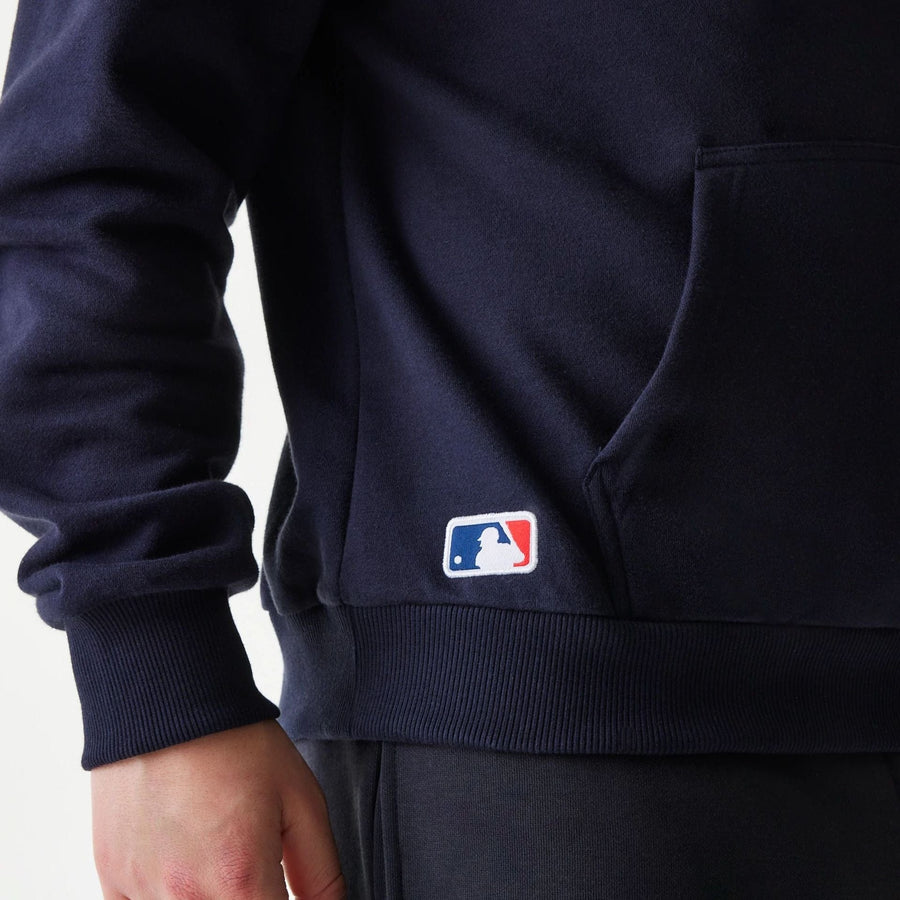 The Male model is wearing New York Yankees MLB League Essential Navy Oversized Pullover Hoodie 6