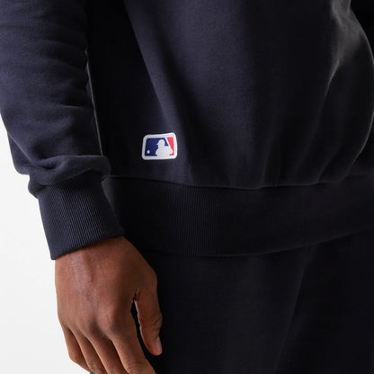 The Male model is wearing New York Yankees MLB League Essential Midi Navy Oversized Crew Neck Sweater 6