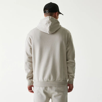 The Male model is wearing New York Yankees MLB League Essential Cream Oversized Pullover Hoodie 2