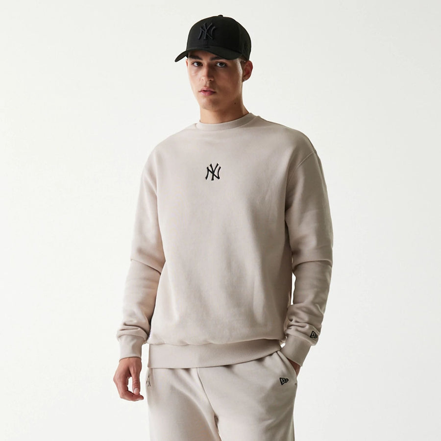 The Male model is wearing New York Yankees MLB League Essential Midi Cream Oversized Crew Neck Sweater 3