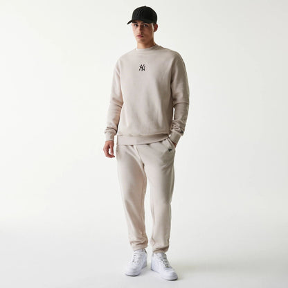 The Male model is wearing New York Yankees MLB League Essential Midi Cream Oversized Crew Neck Sweater 8