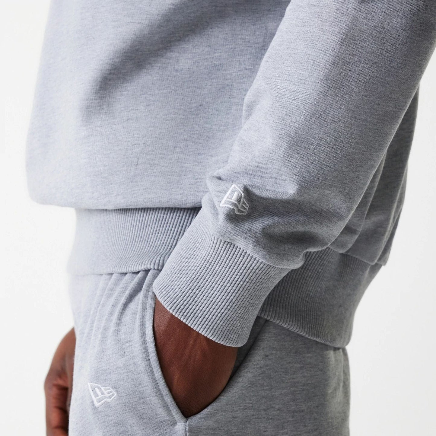 The Male model is wearing New York Yankees MLB League Essential Midi Grey Oversized Crew Neck Sweater 6