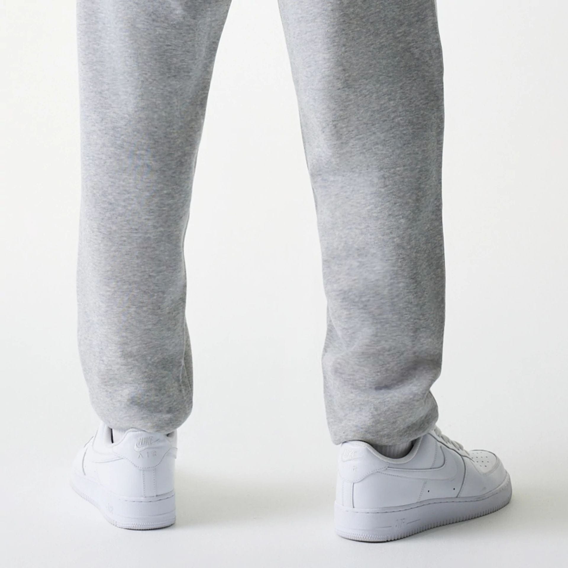 The Male model is wearing New York Yankees MLB League Essential Grey Joggers 7