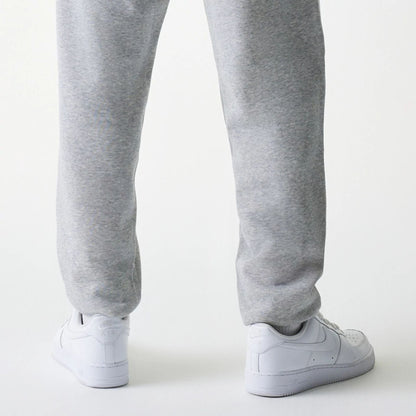 The Male model is wearing New York Yankees MLB League Essential Grey Joggers 7