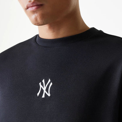 The Male model is wearing New York Yankees MLB League Essential Midi Black Oversized Crew Neck Sweater 3