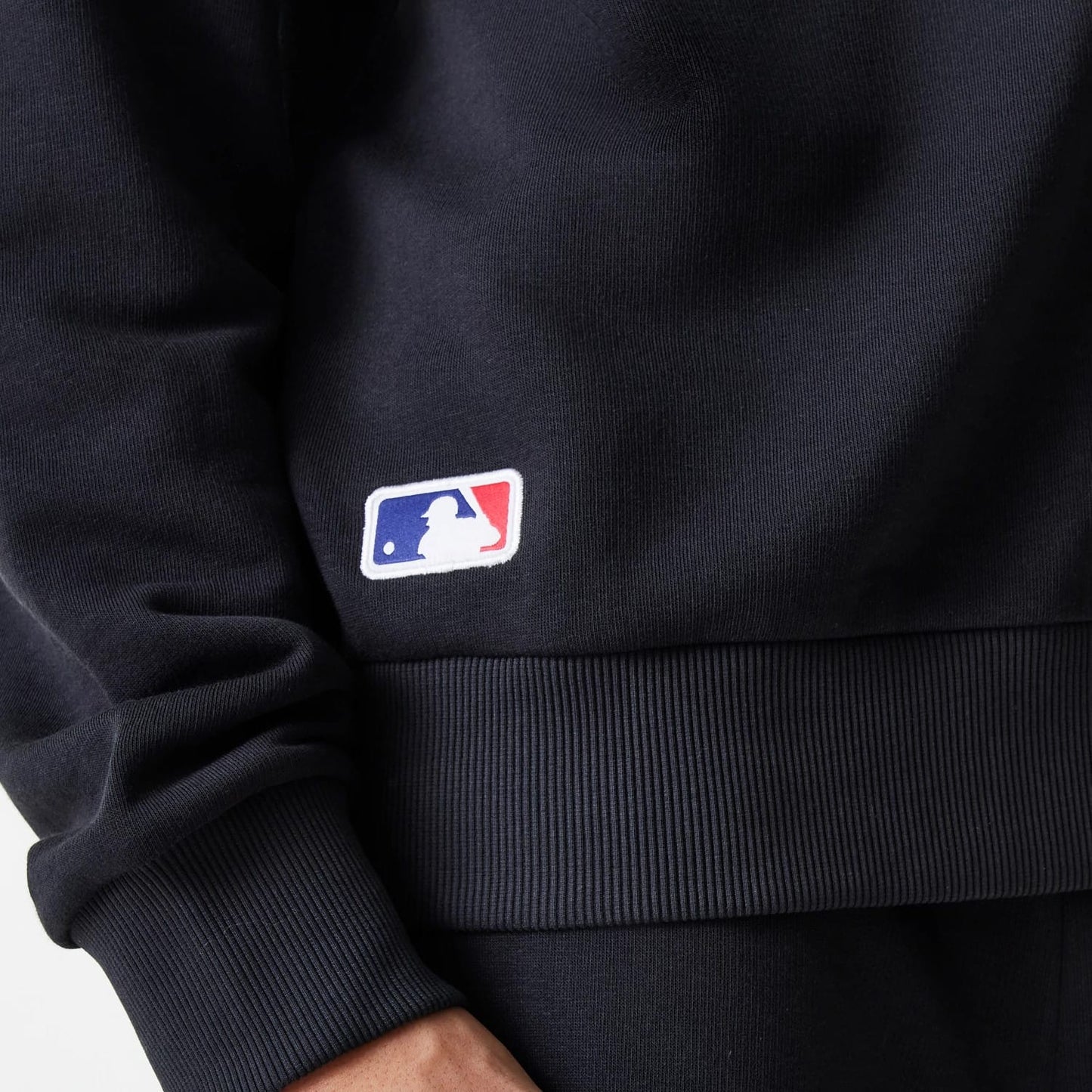 The Male model is wearing New York Yankees MLB League Essential Midi Black Oversized Crew Neck Sweater 6