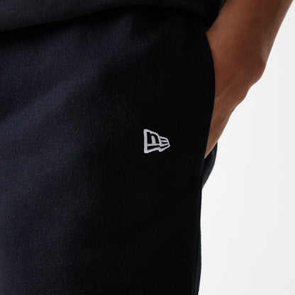 The Male model is wearing New York Yankees MLB League Essential Midi Black Shorts 5