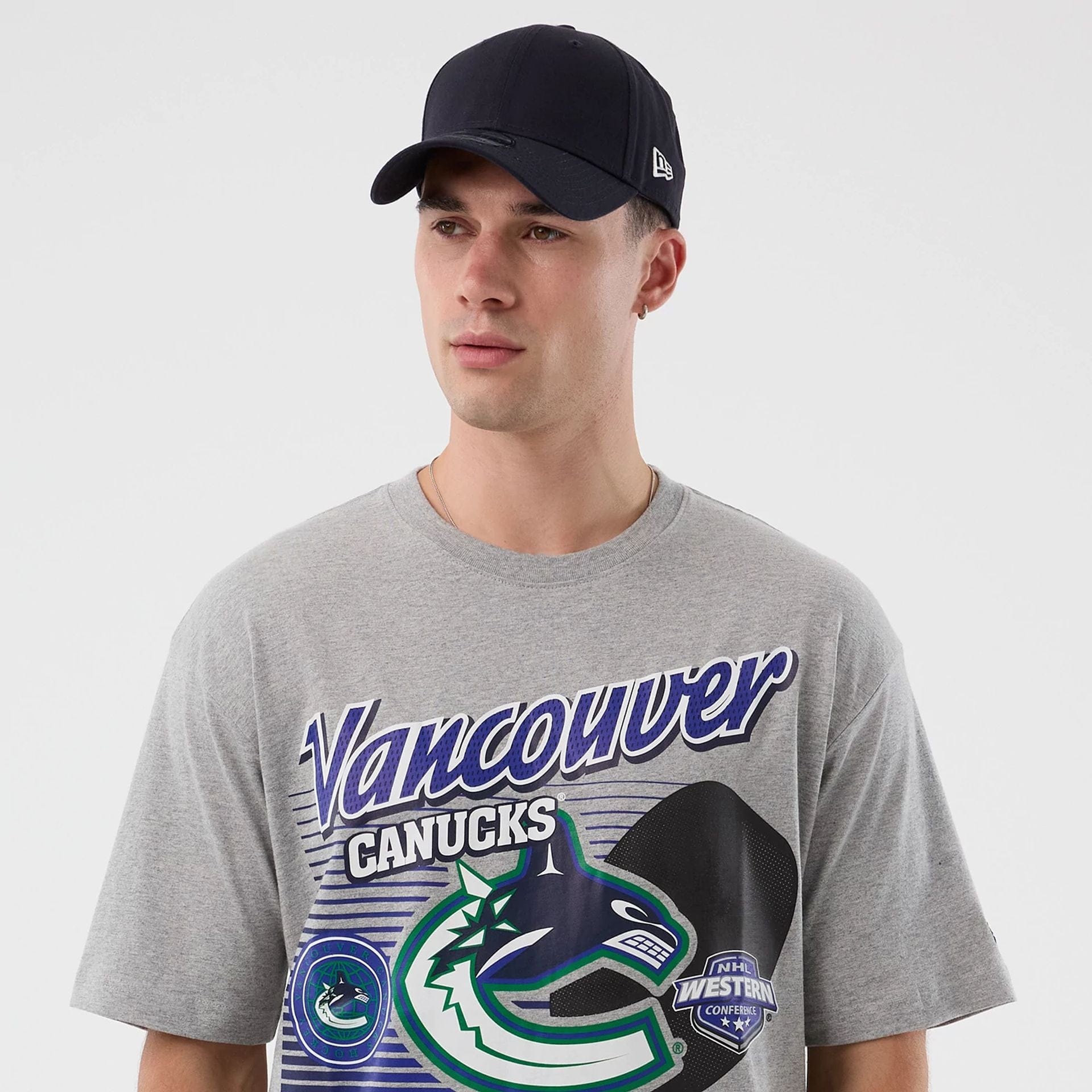 The Male model is wearing Vancouver Canucks NHL Sport Classic Grey T-Shirt 4