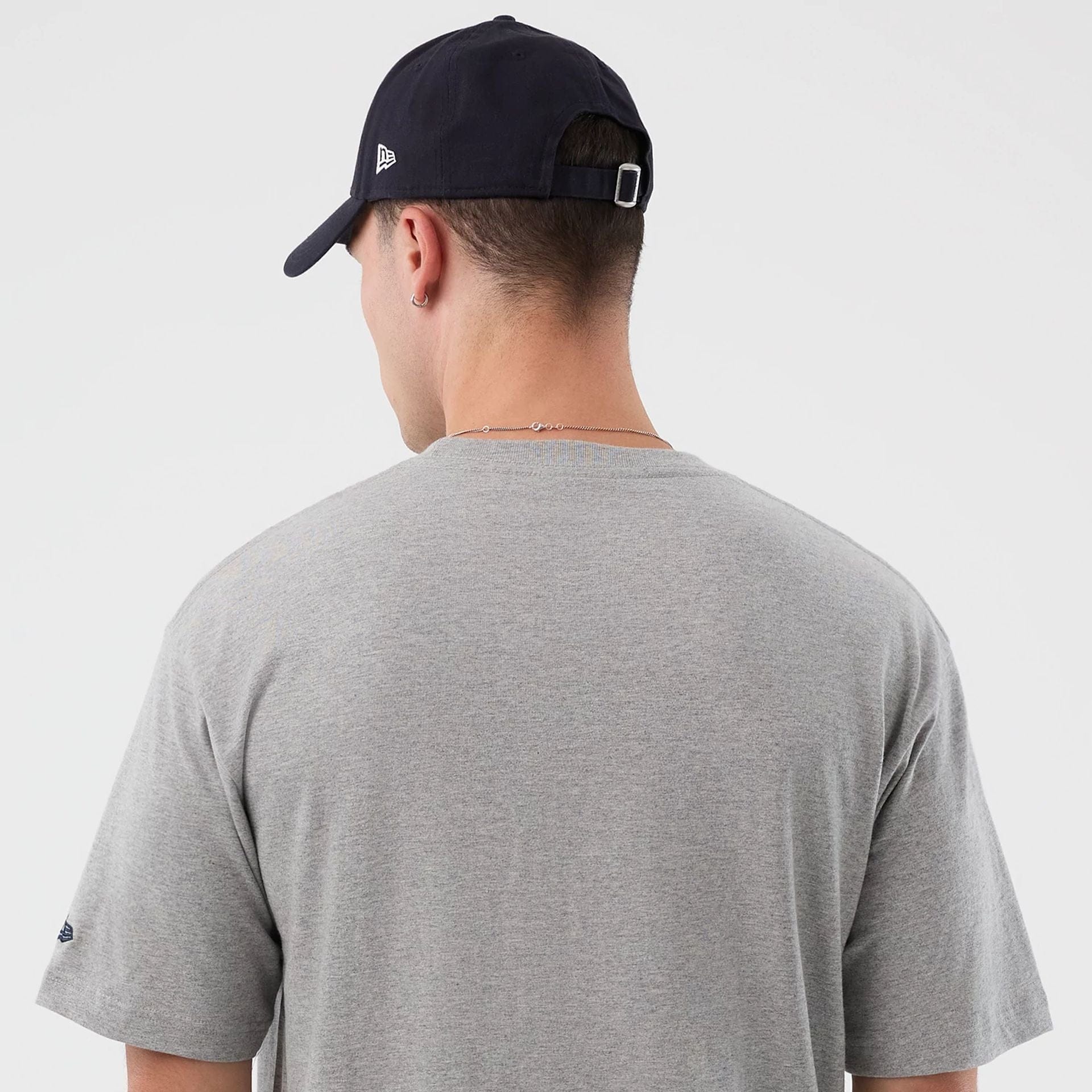 The Male model is wearing Vancouver Canucks NHL Sport Classic Grey T-Shirt 5