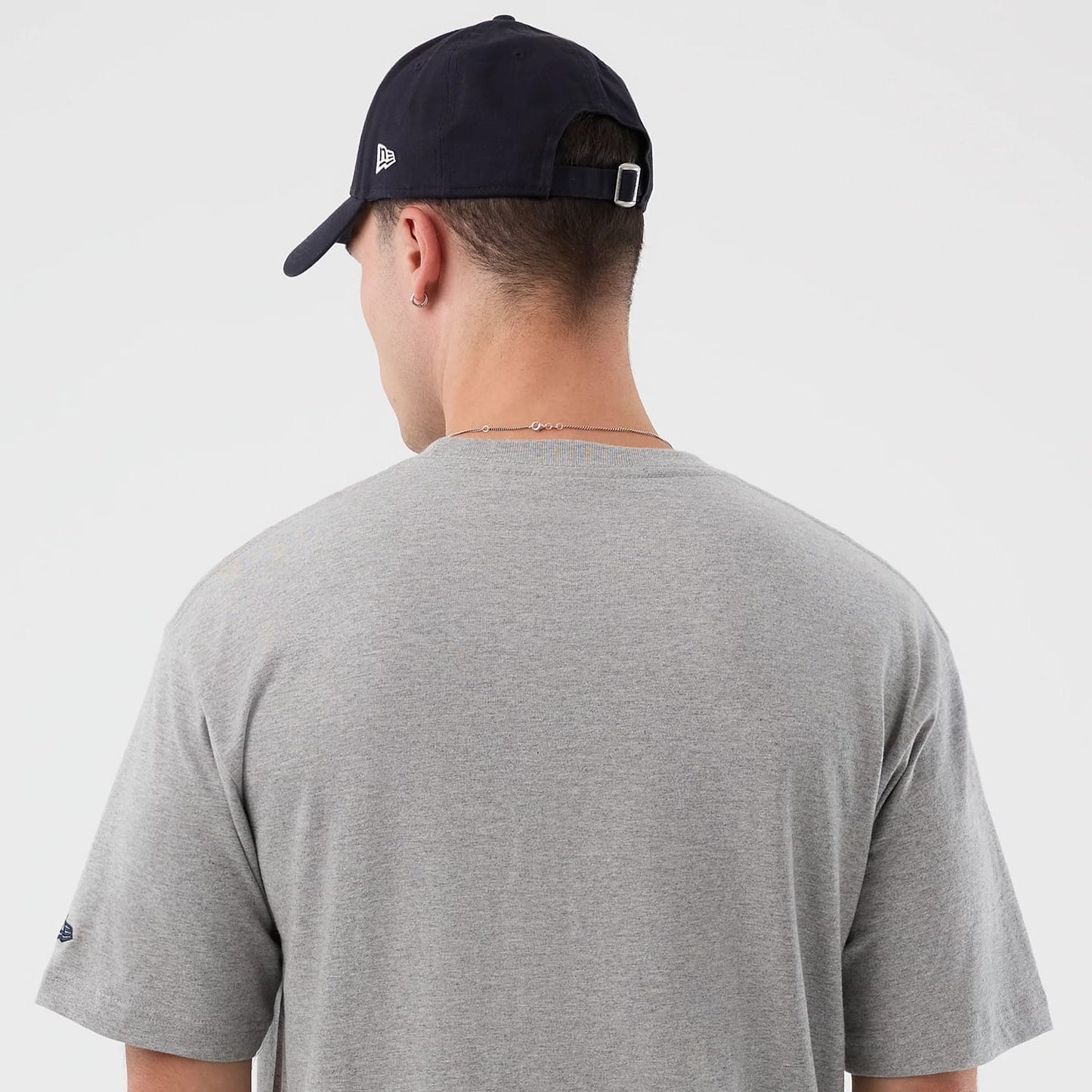 The Male model is wearing Vancouver Canucks NHL Sport Classic Grey T-Shirt 5
