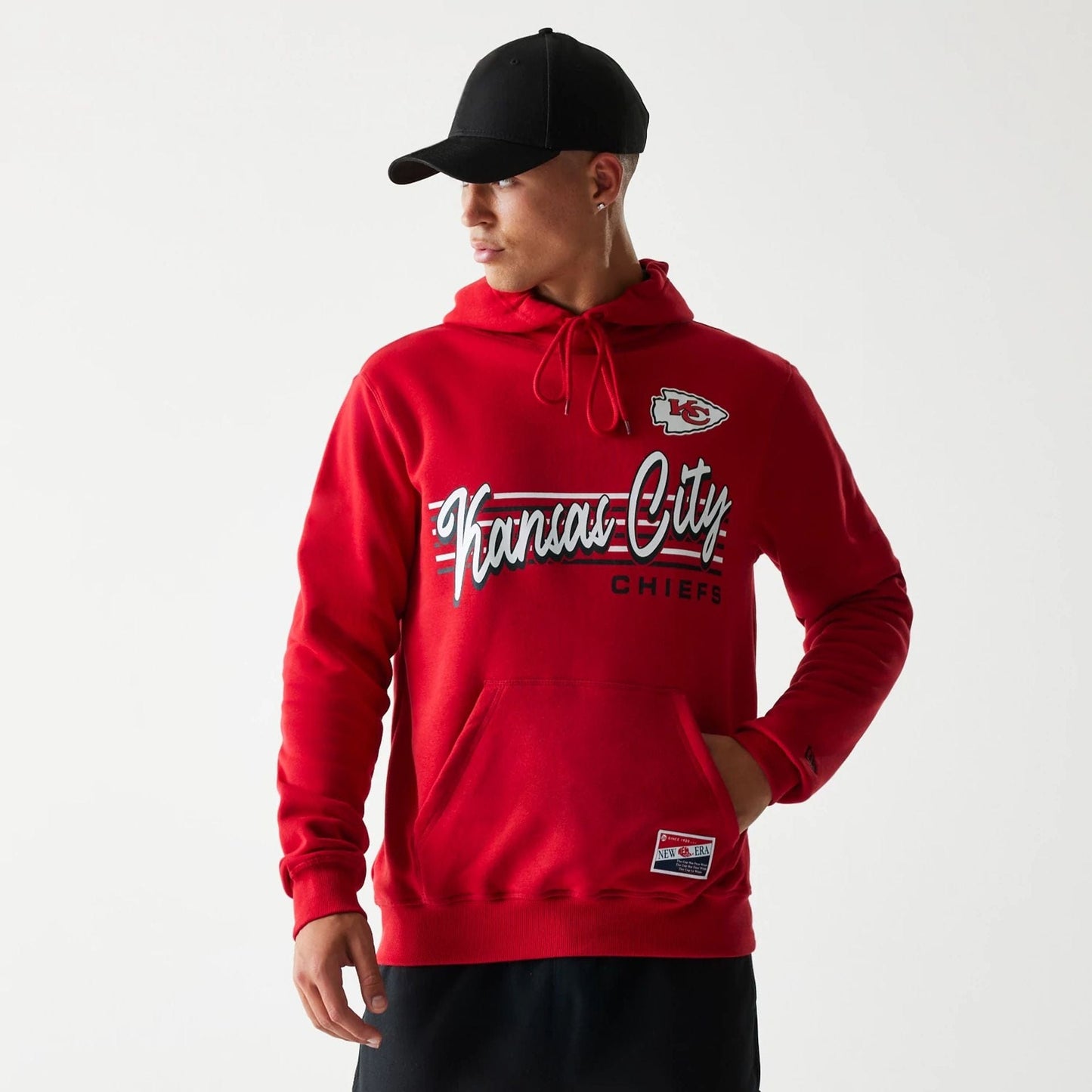 The Male model is wearing Kansas City Chiefs NFL Throwback Red Pullover Hoodie 1