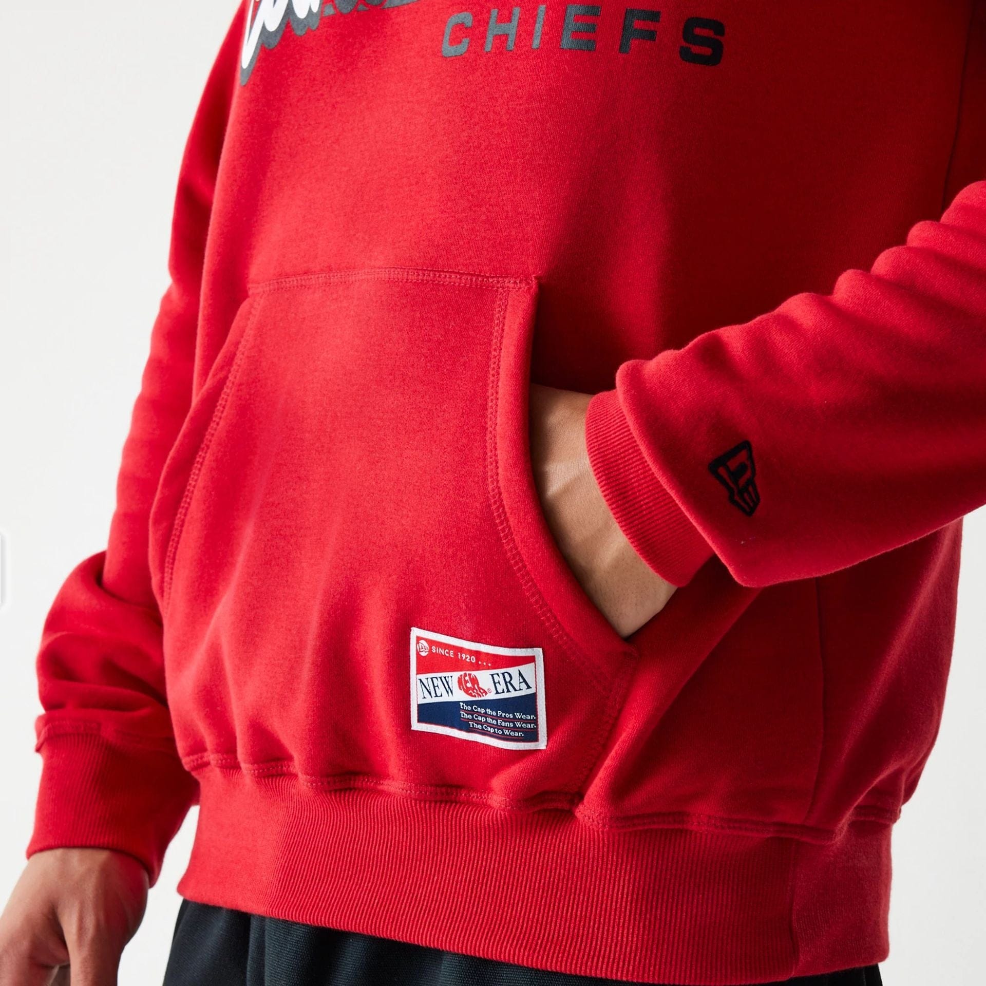 The Male model is wearing Kansas City Chiefs NFL Throwback Red Pullover Hoodie 4