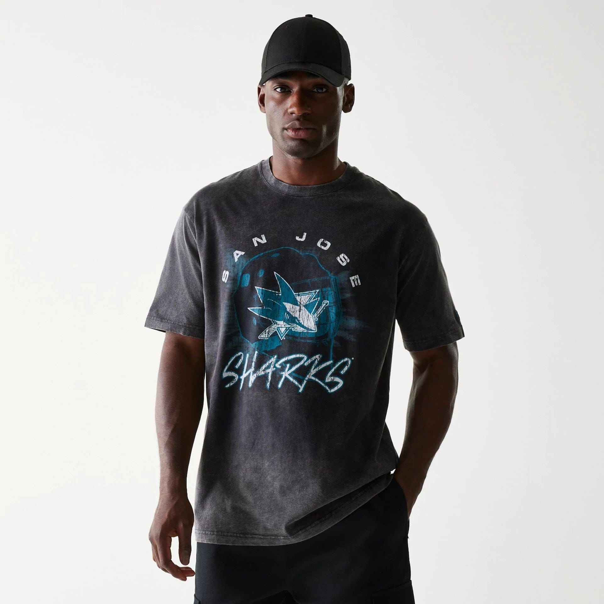 The Male model is wearing San Jose Sharks NHL Sport Night Black T-Shirt 1