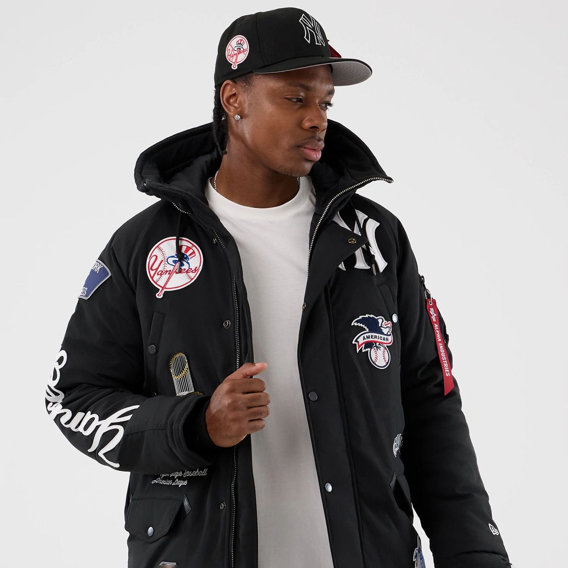 The Male model is wearing New York Yankees MLB X Alpha Black Parka Jacket 3