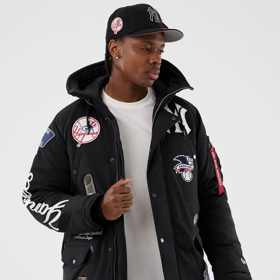 The Male model is wearing New York Yankees MLB X Alpha Black Parka Jacket 3