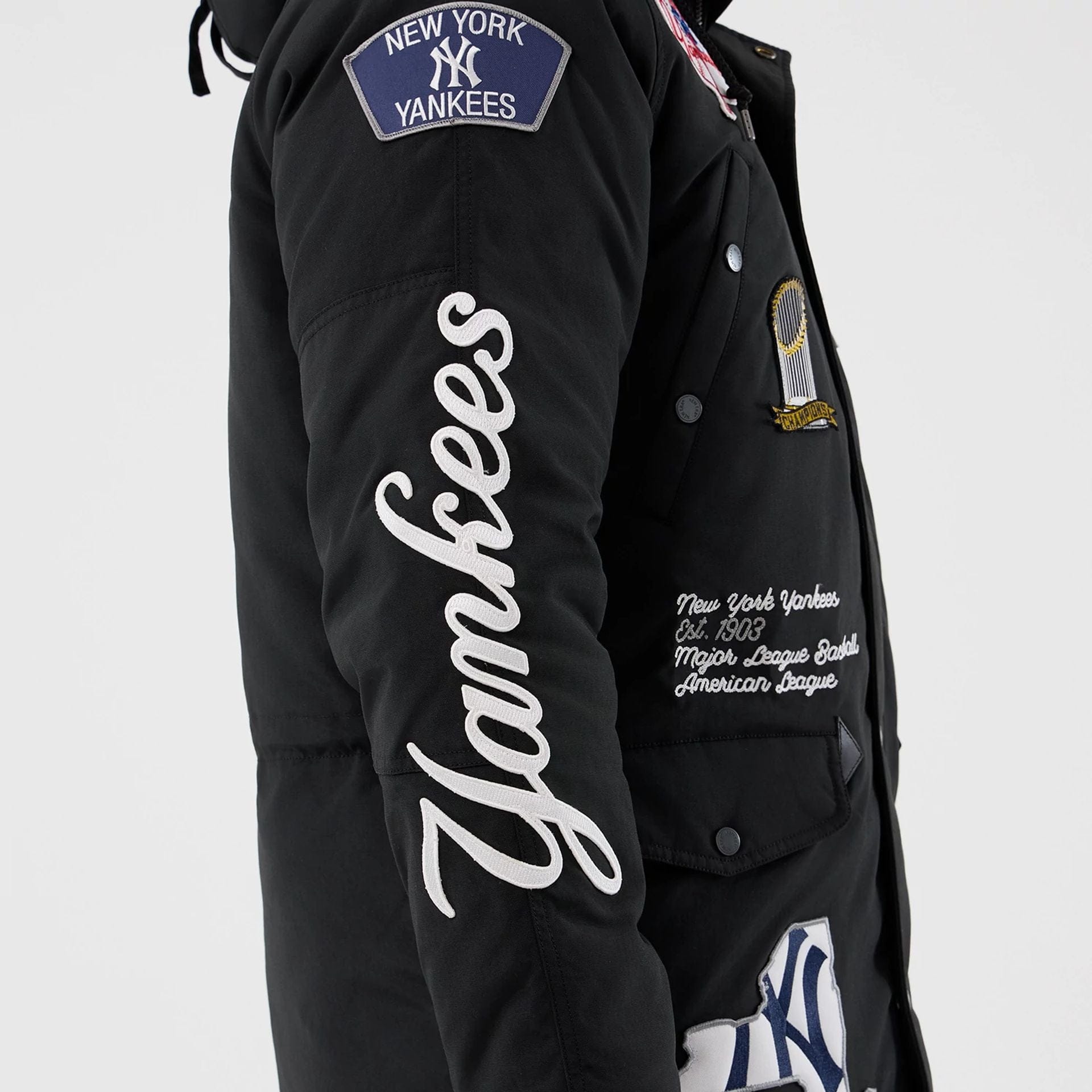 The Male model is wearing New York Yankees MLB X Alpha Black Parka Jacket 5