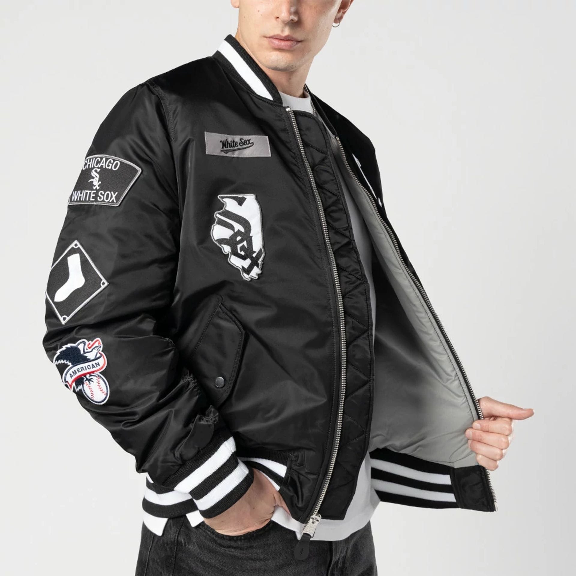 The Male model is wearing Chicago White Sox MLB X Alpha Black Bomber Jacket 3