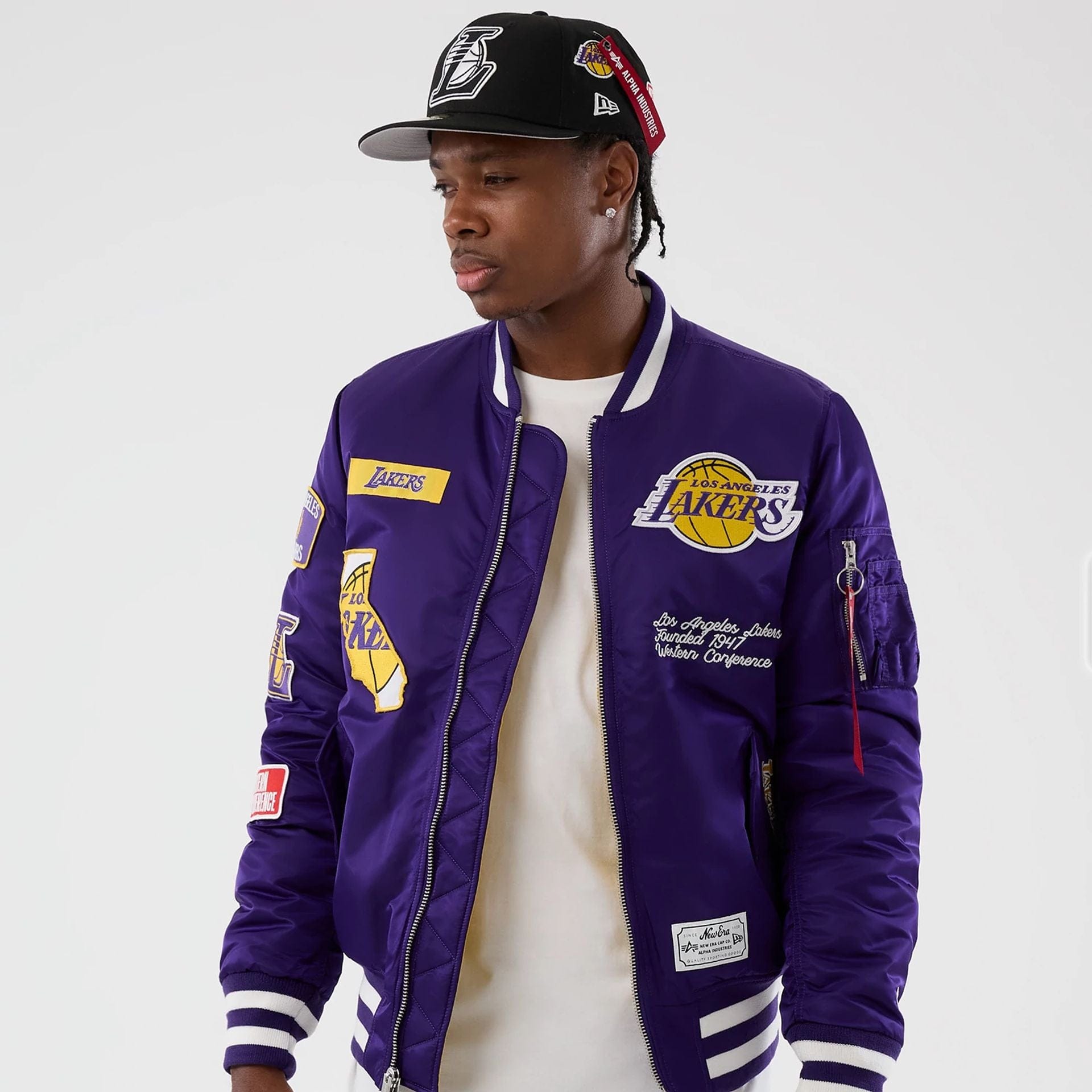The Male model is wearing LA Lakers NBA x Alpha Purple Jacket 7