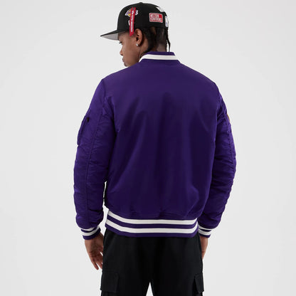 The Male model is wearing LA Lakers NBA x Alpha Purple Jacket 2