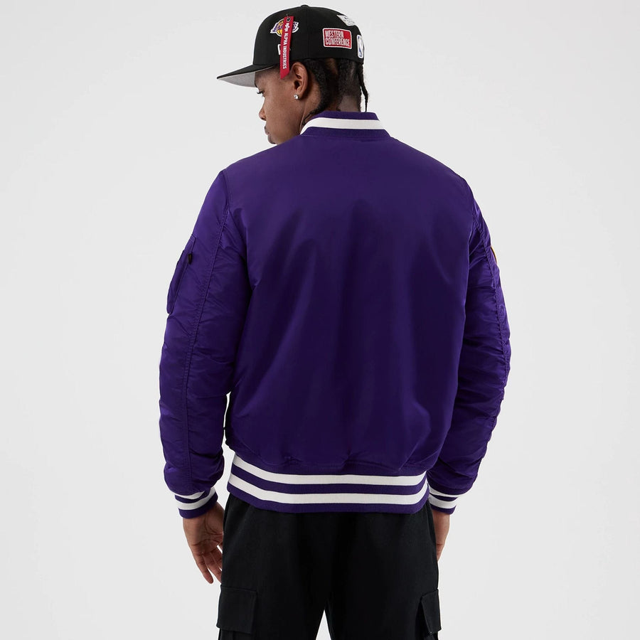 The Male model is wearing LA Lakers NBA x Alpha Purple Jacket 2