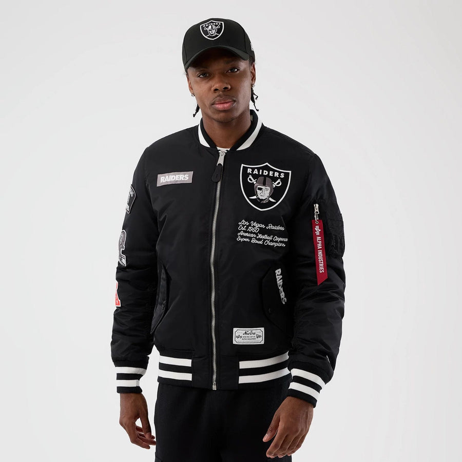 The Male model is wearing Las Vegas Raiders NFL x Alpha Black Jacket 1