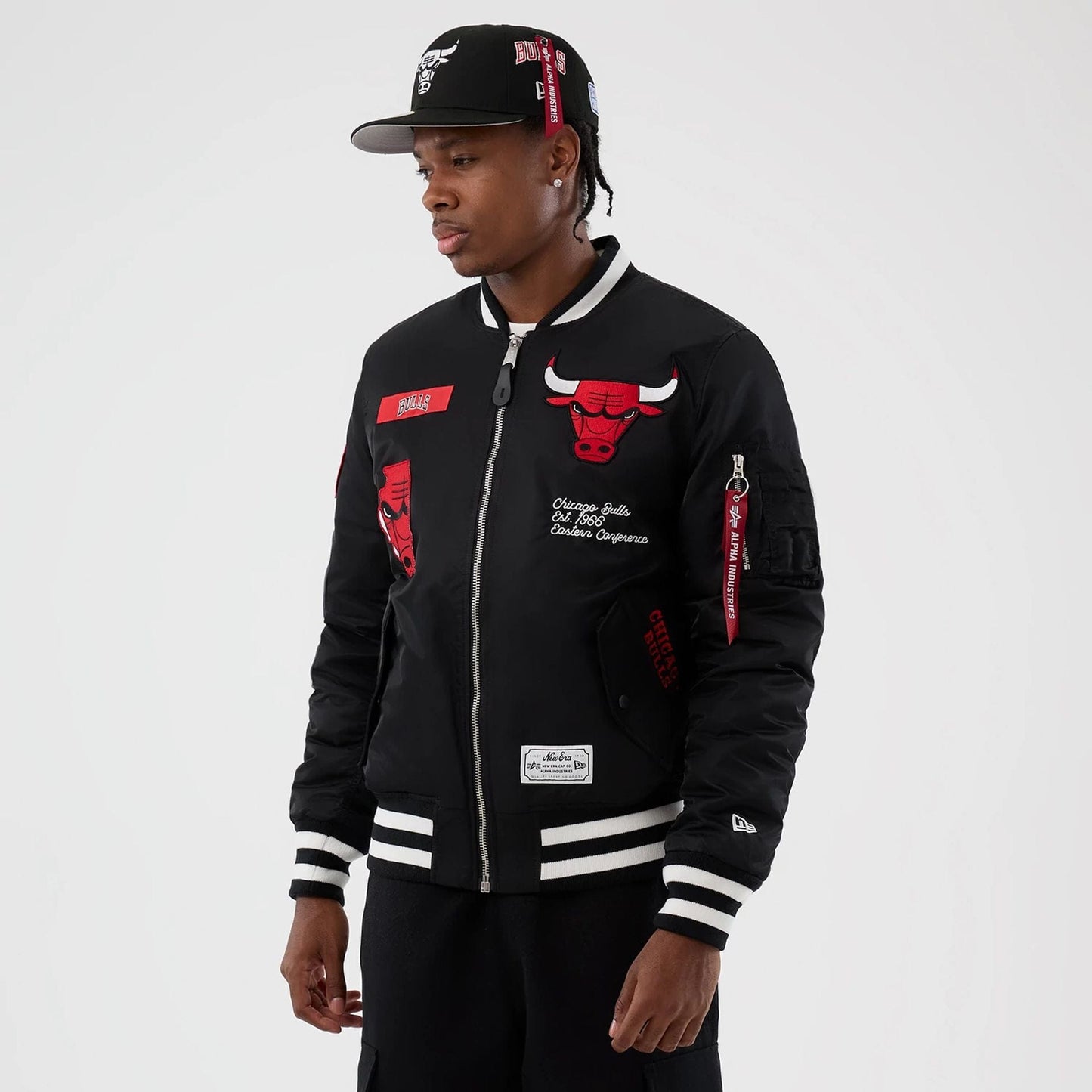 The Male model is wearing Chicago Bulls NBA x Alpha Black Jacket 1